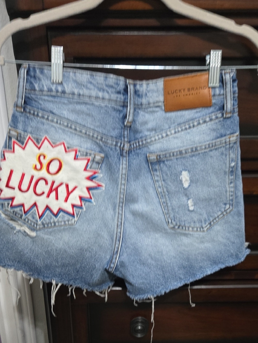 Lucky Brand Light Blue Denim Cutoff Shorts with 'So Lucky' Patch